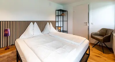 Ein Bett oder Betten in einem Zimmer der Unterkunft Eden Apartments Vista Lago