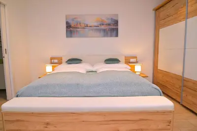 Ein Bett oder Betten in einem Zimmer der Unterkunft Ferienwohnung Rudolfstraße