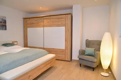 Ein Bett oder Betten in einem Zimmer der Unterkunft Ferienwohnung Rudolfstraße