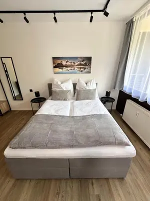 Ein Bett oder Betten in einem Zimmer der Unterkunft Urlaub im Zentrum von Bad Aussee
