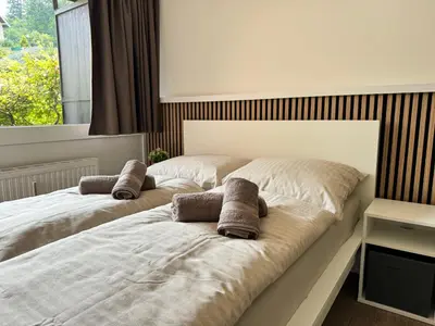 Ein Bett oder Betten in einem Zimmer der Unterkunft Ferienwohnung im Zentrum von Bad Aussee