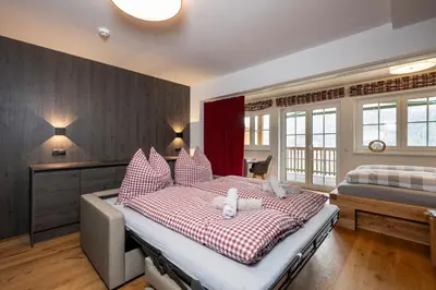 Ein Bett oder Betten in einem Zimmer der Unterkunft Planai Home - Schladming