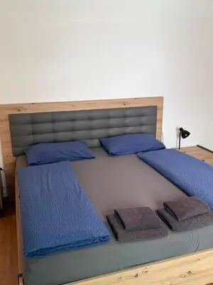 Ein Bett oder Betten in einem Zimmer der Unterkunft Sunside Apartments