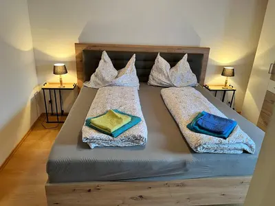 Ein Bett oder Betten in einem Zimmer der Unterkunft Sunside Apartments