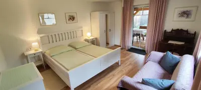 Ein Bett oder Betten in einem Zimmer der Unterkunft Ferienwohnung Elisabeth Laimer