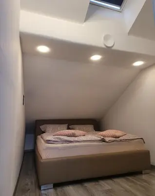 Ein Bett oder Betten in einem Zimmer der Unterkunft Siebter Himmel