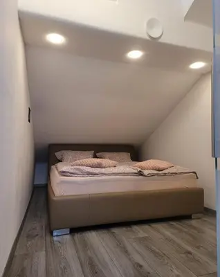 Ein Bett oder Betten in einem Zimmer der Unterkunft Siebter Himmel