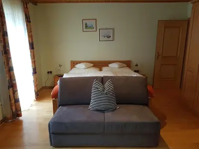 Ein Bett oder Betten in einem Zimmer der Unterkunft Der Perweinhof