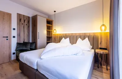 Ein Bett oder Betten in einem Zimmer der Unterkunft Höflehner Premium Gumpen Lodge