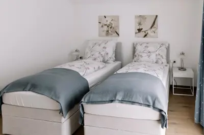 Ein Bett oder Betten in einem Zimmer der Unterkunft Haus Montis