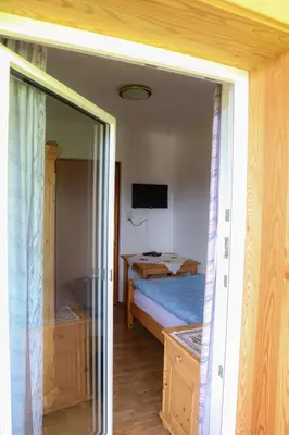 Ein Bett oder Betten in einem Zimmer der Unterkunft Ferienwohnung Trisselwand