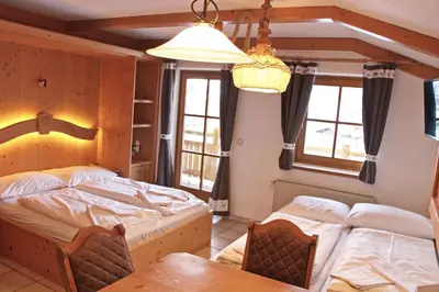 Ein Bett oder Betten in einem Zimmer der Unterkunft AmadéLodge