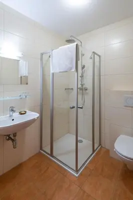 Ein Badezimmer in der Unterkunft Haus Hödlmoser