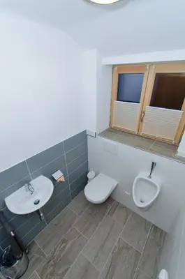 Ein Badezimmer in der Unterkunft David Appartments