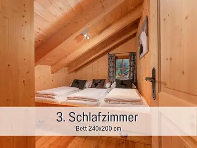 Ein Bett oder Betten in einem Zimmer der Unterkunft Chalet am Oberhausberg, Region Schladming Dachstein