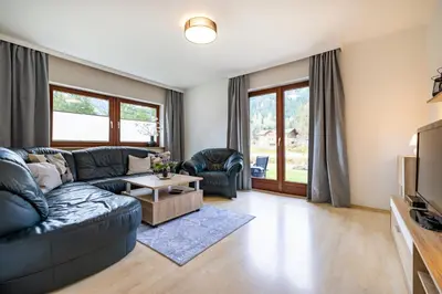 Ein Sitzbereich in der Unterkunft Ferienhaus Waldwinkl