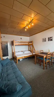 Ein Bett oder Betten in einem Zimmer der Unterkunft Slunný apartmán v Sonnenalm - Bad Mitterndorf