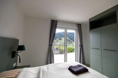 Ein Bett oder Betten in einem Zimmer der Unterkunft Panorama Apartment
