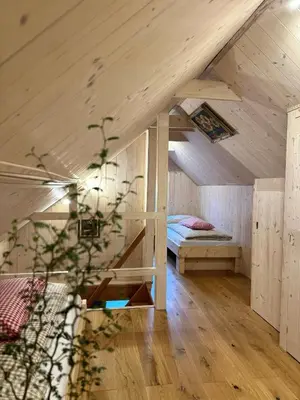 Ein Bett oder Betten in einem Zimmer der Unterkunft Ferienhaus - Senn-Inn im Zentrum von Schladming