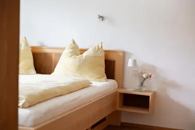 Ein Bett oder Betten in einem Zimmer der Unterkunft Urlaub am Dichtlhof
