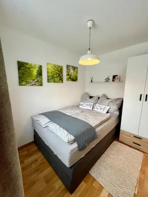 Ein Bett oder Betten in einem Zimmer der Unterkunft Wohnung in Gmunden Wochen und Monatsweise