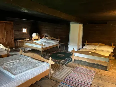 Ein Bett oder Betten in einem Zimmer der Unterkunft Sauschneiderhof