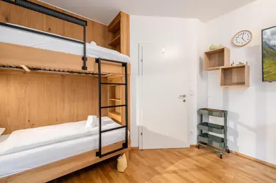 Ein Bett oder Betten in einem Zimmer der Unterkunft Highland Moments Apartment - by myNests