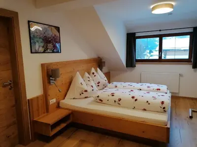 Ein Bett oder Betten in einem Zimmer der Unterkunft Schüttbachhof Appartements