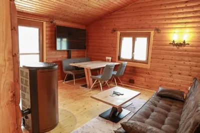 Ein Sitzbereich in der Unterkunft Landhausidylle
