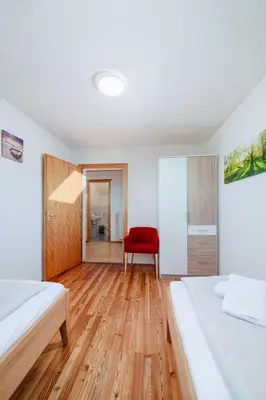 Ein Bett oder Betten in einem Zimmer der Unterkunft Apartment Ferienwohnung Grimmingblick by Interhome