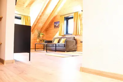 Ein Sitzbereich in der Unterkunft Wood Apartments 4 Jahreszeiten
