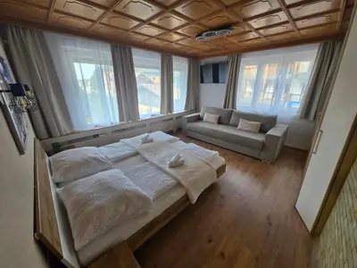 Ein Bett oder Betten in einem Zimmer der Unterkunft Haus Bellaflora Apartman