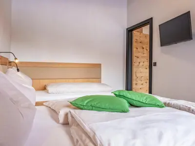 Ein Bett oder Betten in einem Zimmer der Unterkunft Deluxe Zirberl Top 5
