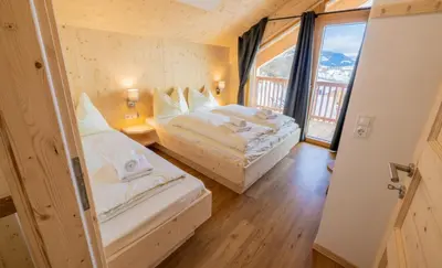 Ein Bett oder Betten in einem Zimmer der Unterkunft Alpenchalet Mountain Retreat Murau
