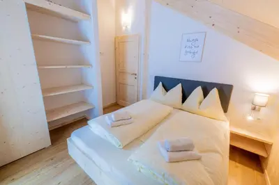Ein Bett oder Betten in einem Zimmer der Unterkunft Alpenchalet Mountain Retreat Murau