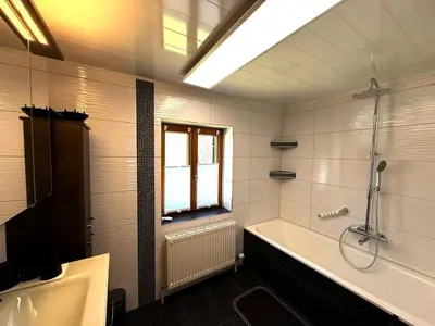 Ein Badezimmer in der Unterkunft Ferienhaus TraunseeStrand
