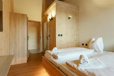 Ein Bett oder Betten in einem Zimmer der Unterkunft Chalets te Best by Schladming-Appartements