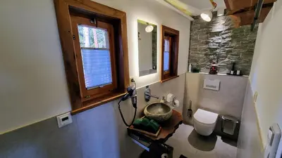 Ein Badezimmer in der Unterkunft Chalet SonnSeitn