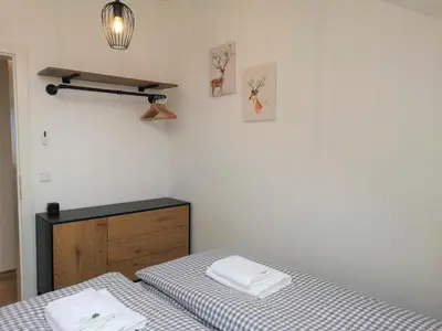 Ein Bett oder Betten in einem Zimmer der Unterkunft Tauplitz Panorama Apartment, 75qm, Balkon und Sauna
