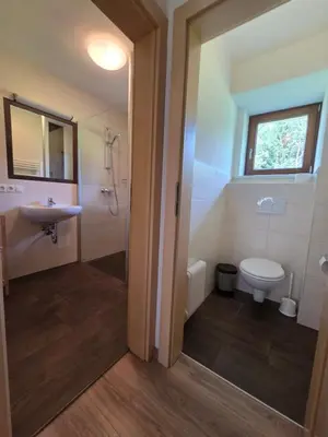 Ein Badezimmer in der Unterkunft Ferienhaus Almfrieden