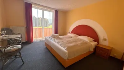 Ein Bett oder Betten in einem Zimmer der Unterkunft Pension Edelweiß Mitterberg