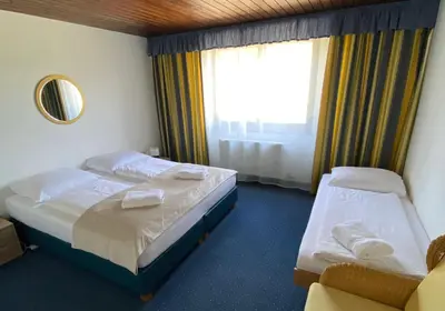 Ein Bett oder Betten in einem Zimmer der Unterkunft Pension Edelweiß Mitterberg
