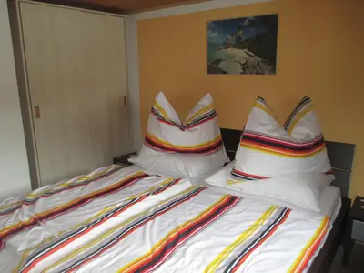 Ein Bett oder Betten in einem Zimmer der Unterkunft Ferienhaus Schwarzenbacher