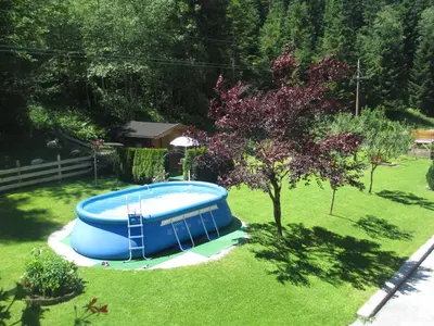 Der Swimmingpool an oder in der Nähe von Ferienhaus Schwarzenbacher