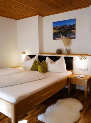 Ein Bett oder Betten in einem Zimmer der Unterkunft Ferienhaus Bucheggerhof