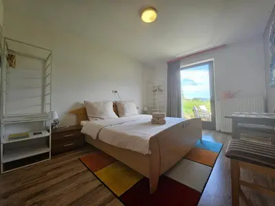 Ein Bett oder Betten in einem Zimmer der Unterkunft Pension Sonnhof Attersee