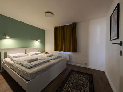 Ein Bett oder Betten in einem Zimmer der Unterkunft mg4 Apartments