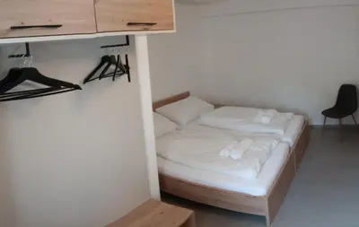 Ein Bett oder Betten in einem Zimmer der Unterkunft NRV twee-persoonskamer met gemeenschappelijke keuken