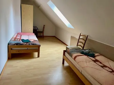 Ein Bett oder Betten in einem Zimmer der Unterkunft Ferienwohnung Sophie