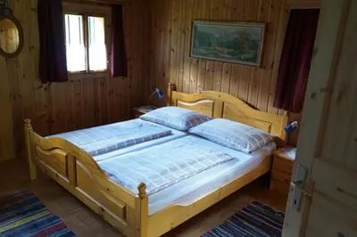 Ein Bett oder Betten in einem Zimmer der Unterkunft Wurzeggeralm